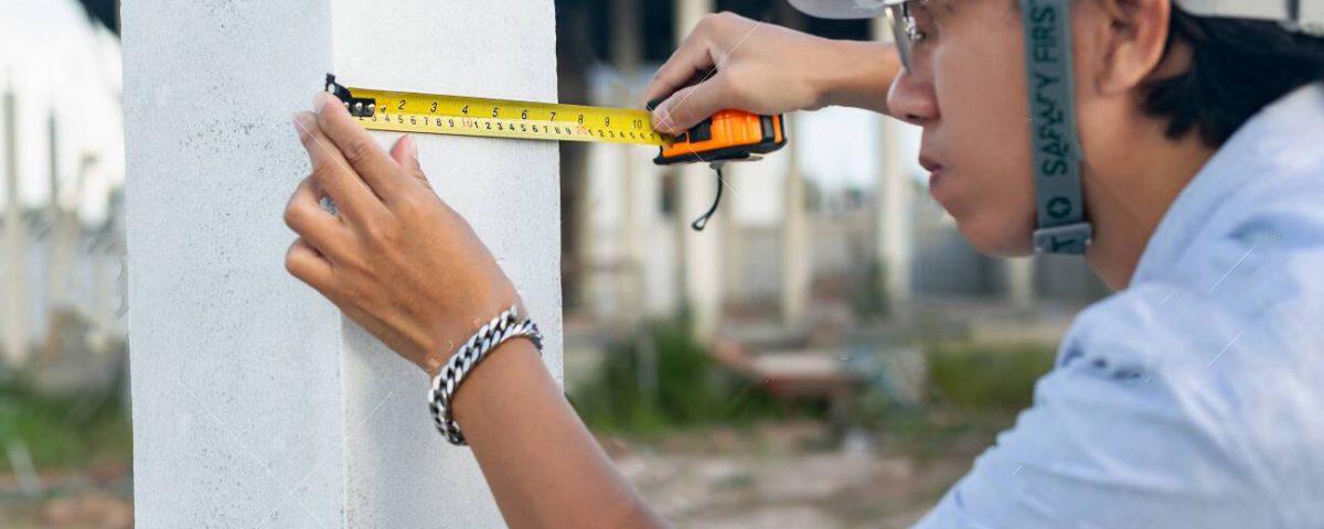 Male architect measuring house wall post ابنیه نو اندیش